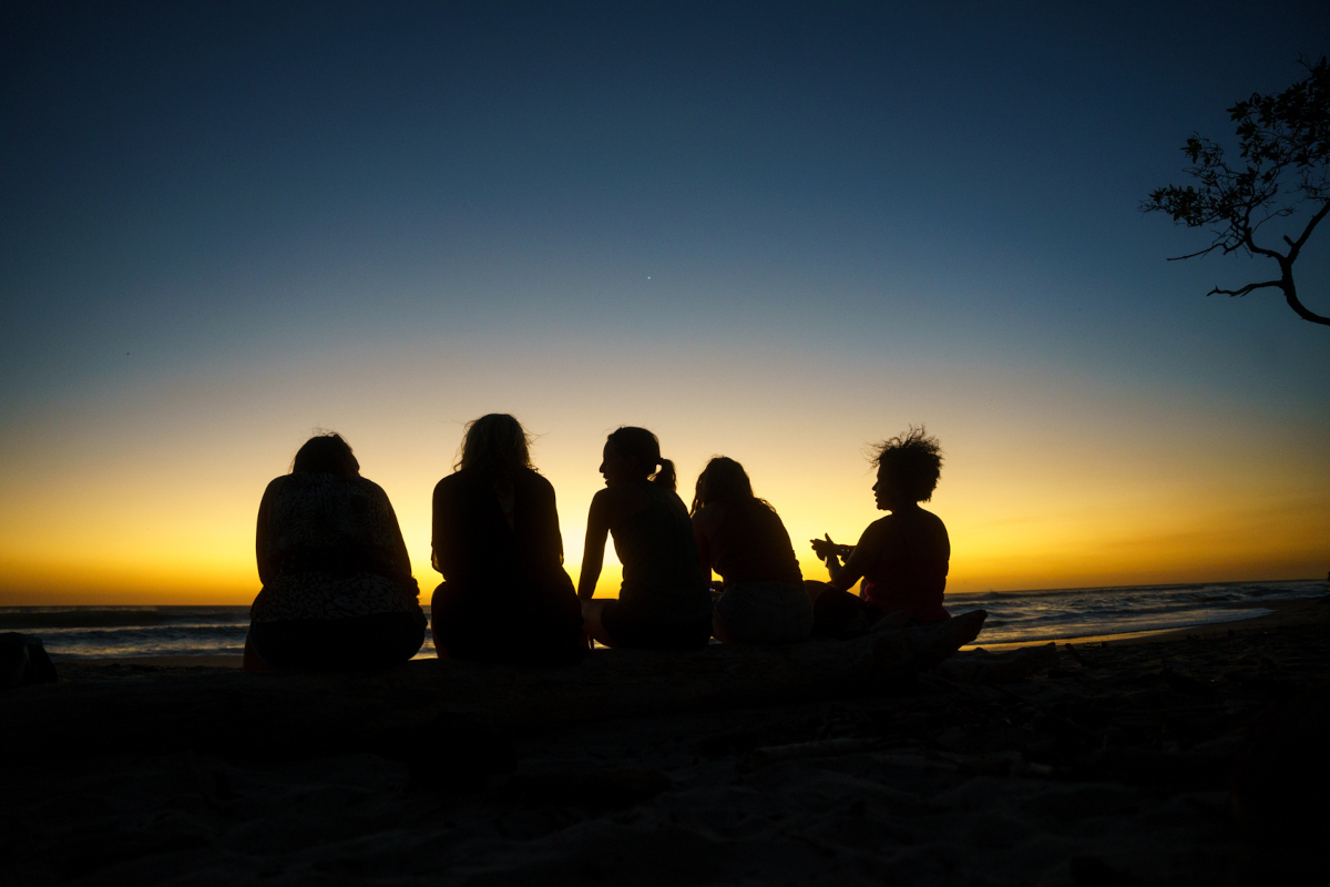 a group watches the sunset destination retreat in Costa Rica