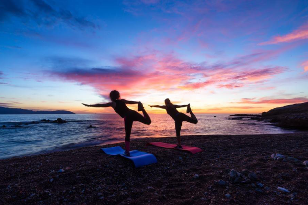 women doing yoga at a retreat in Greece