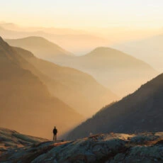 ketamine therapy depicted by a person standing in a mountain setting